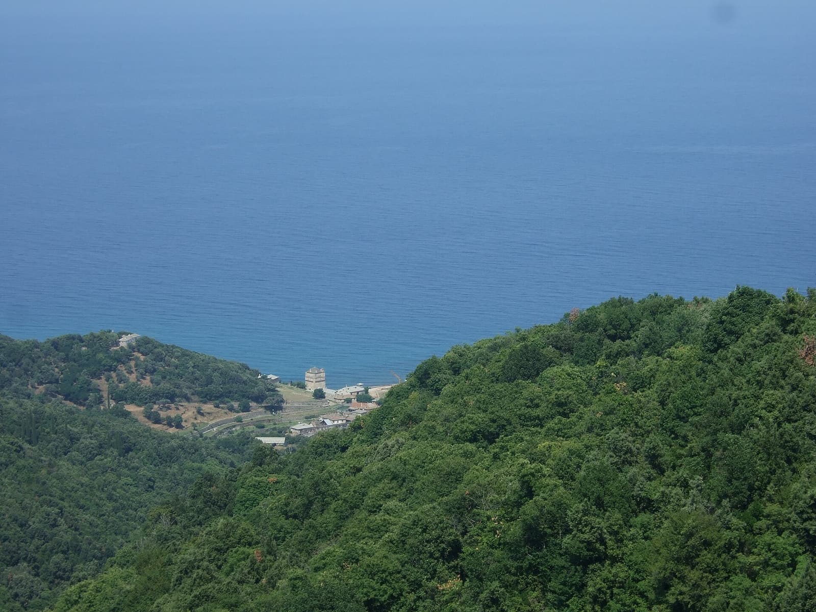 Iviron Monastery on Mount Athos between forest and sea