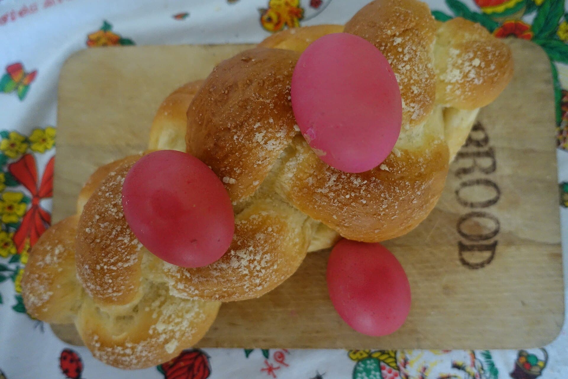 Tsoureki, the braided Easter bread, with red eggs