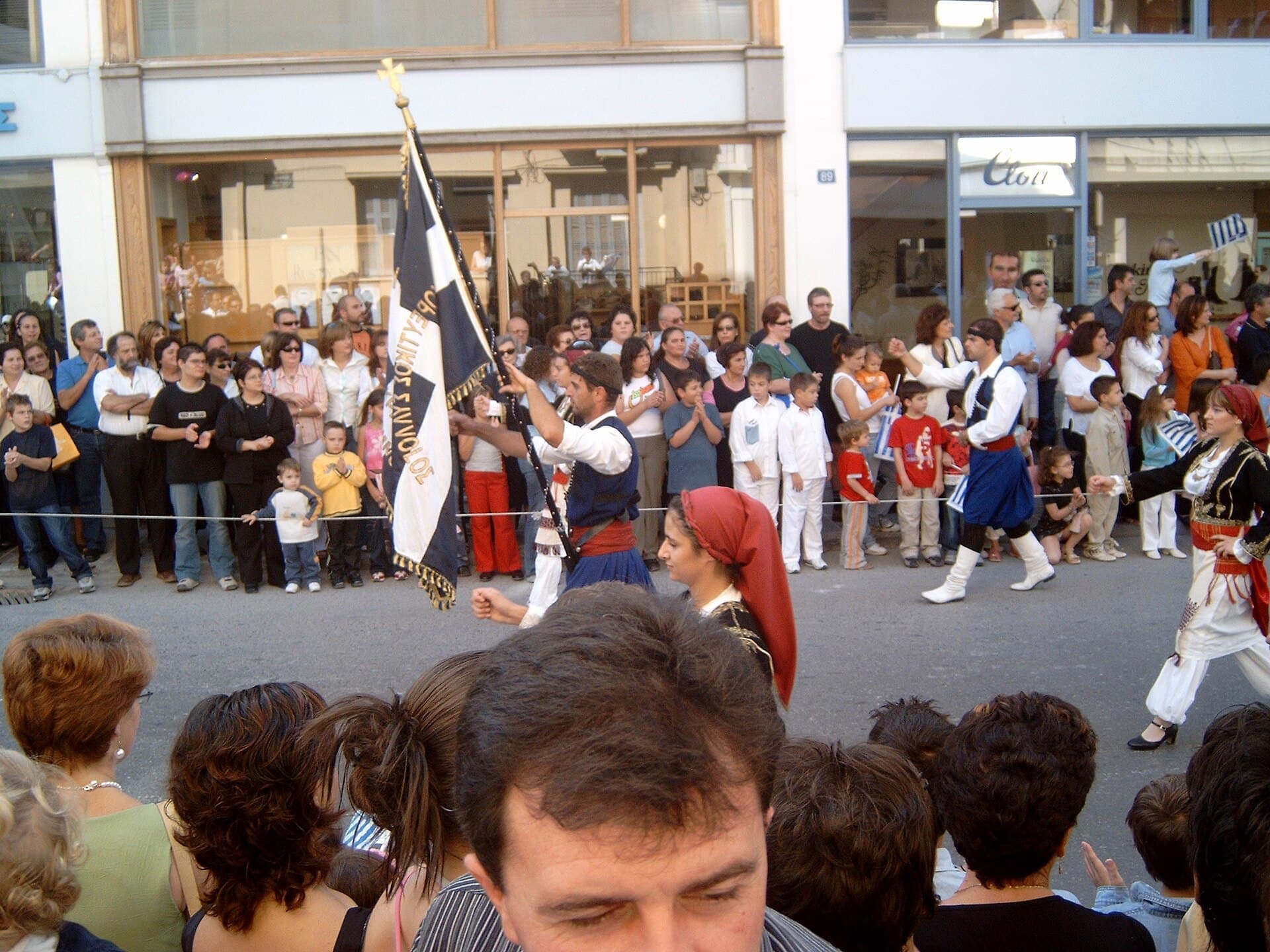 The 28 October parade with flags and traditional costumes