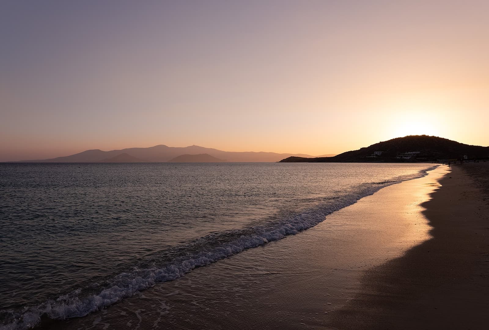 A beach on Naxos at sunset in high summer